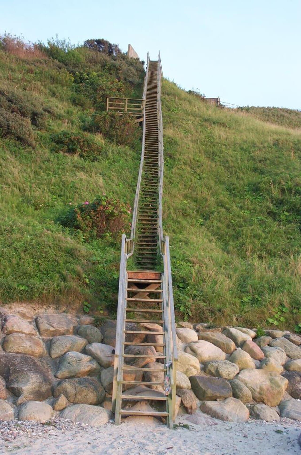 Staircase with Wooden Railing